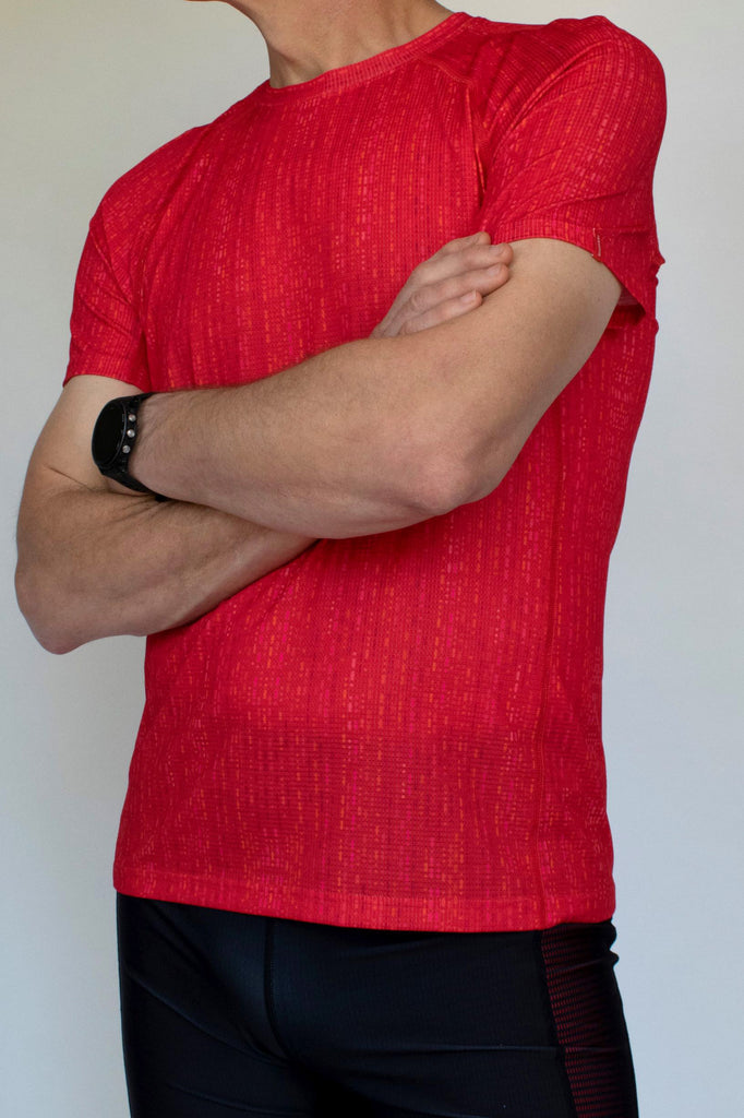 Abel coral tee and Noble copper shorts-left side front view